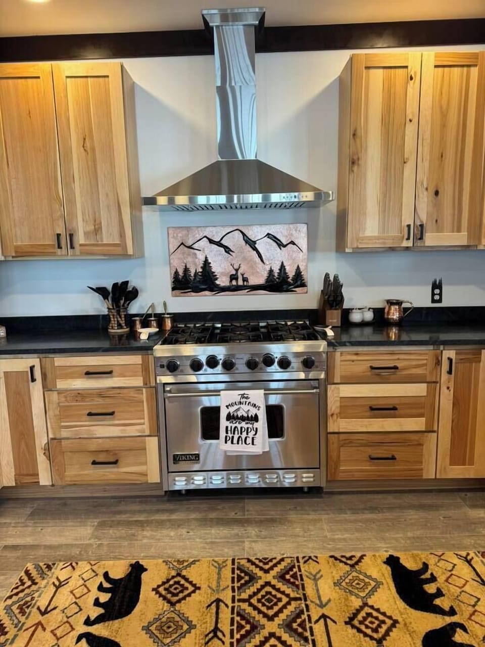 Viking duel fuel for all of those chefs out there. Beautiful cabinets with air fryer, blender and all of the cooking essentials to host 20 guests in style. 