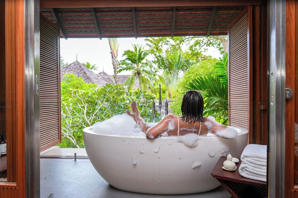 La Maison | Bathroom | Separate tub and shower, deep soaking tub, free toiletries, hair dryer
