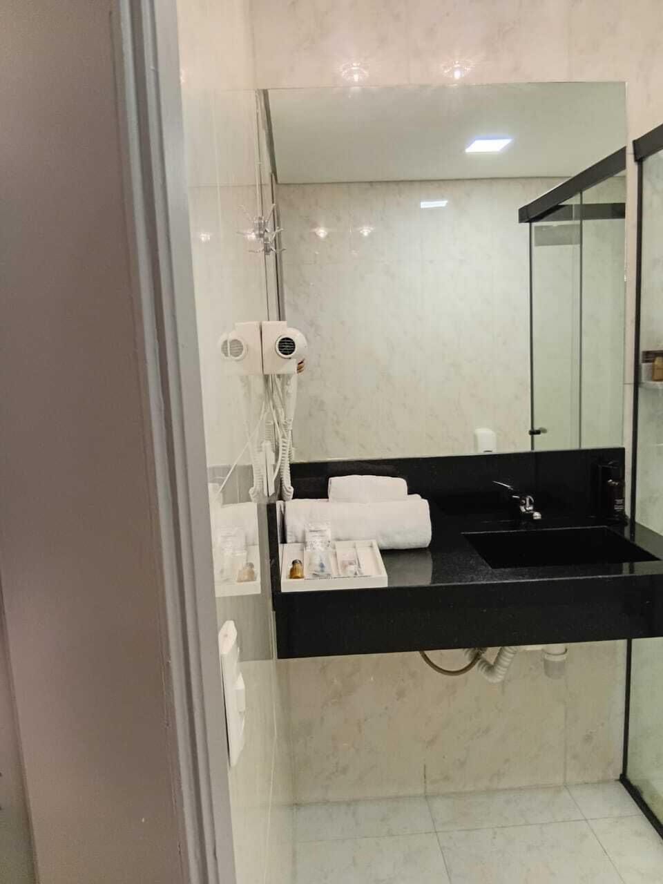 Separate tub and shower, hair dryer, bathrobes, slippers