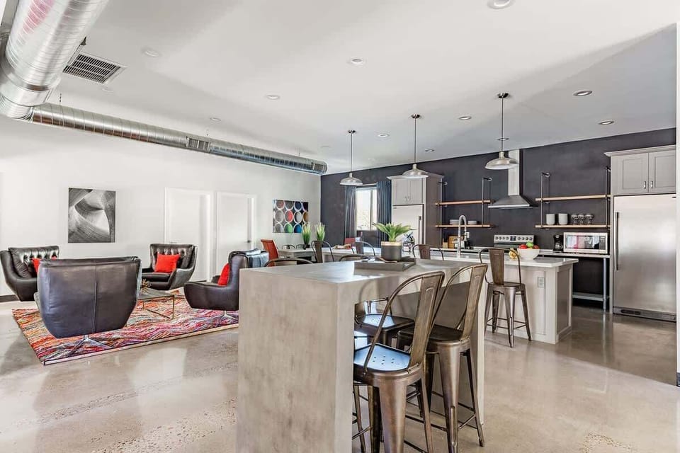 Unit 1: Second living area next to the kitchen that features 4 seats