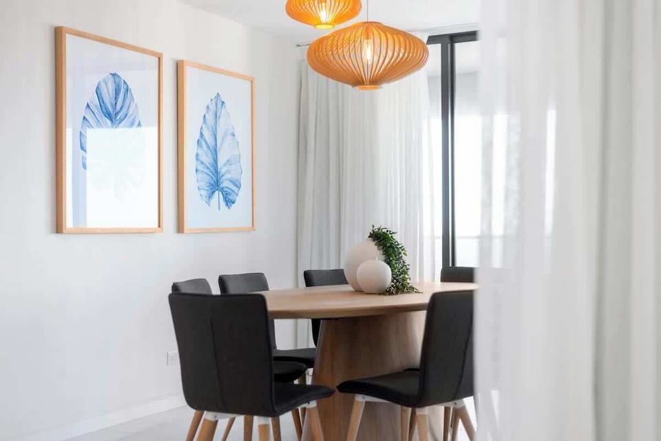 Open plan living, kitchen, and dining for seamless entertaining. 