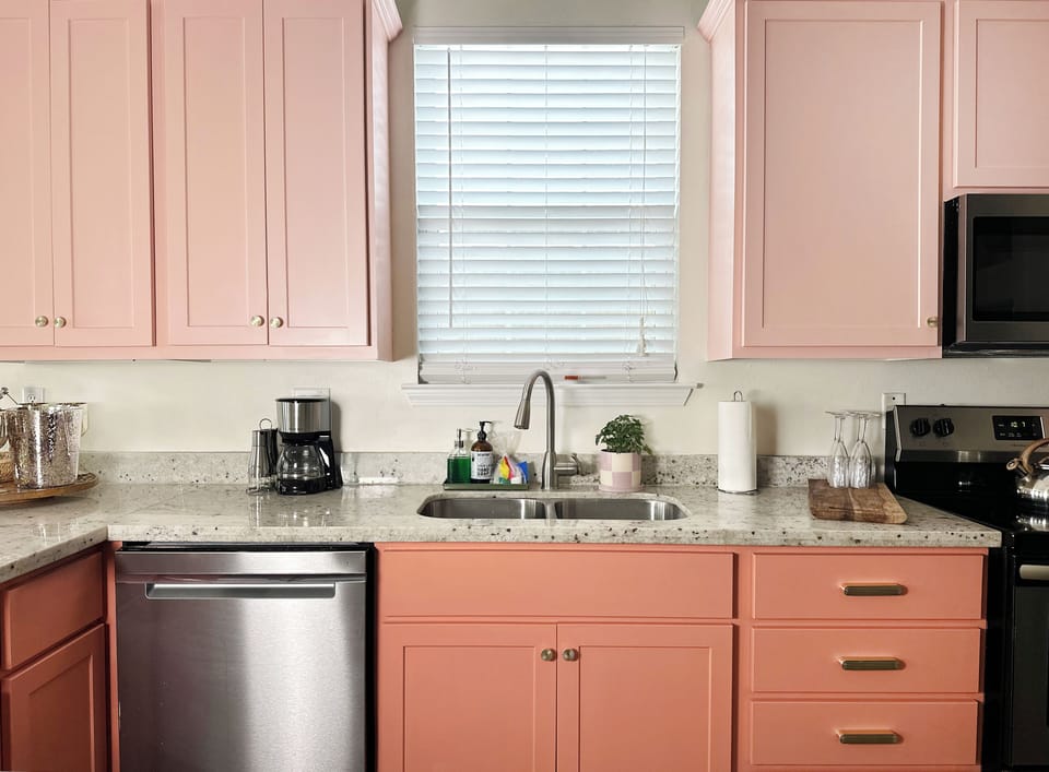 Fully stocked pink retro kitchen