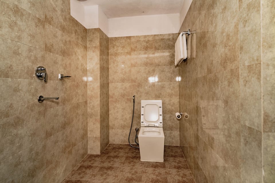 Shower, slippers, soap, toilet paper