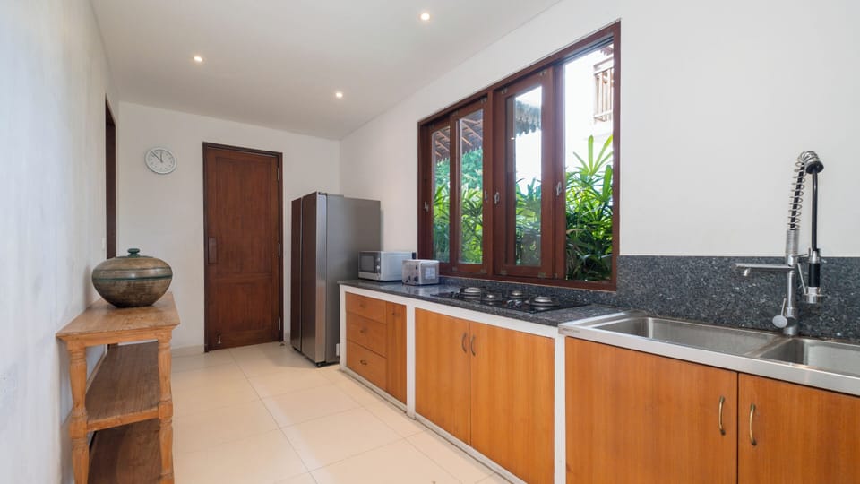 Villa, Pool View | Private kitchen | Fridge, microwave, stovetop, coffee/tea maker