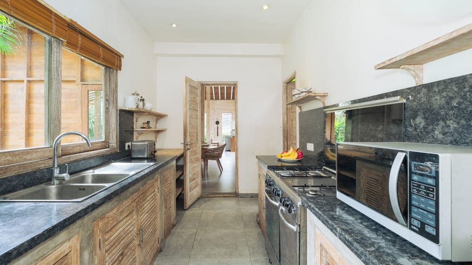 Villa, Pool View | Private kitchen | Fridge, microwave, stovetop, coffee/tea maker