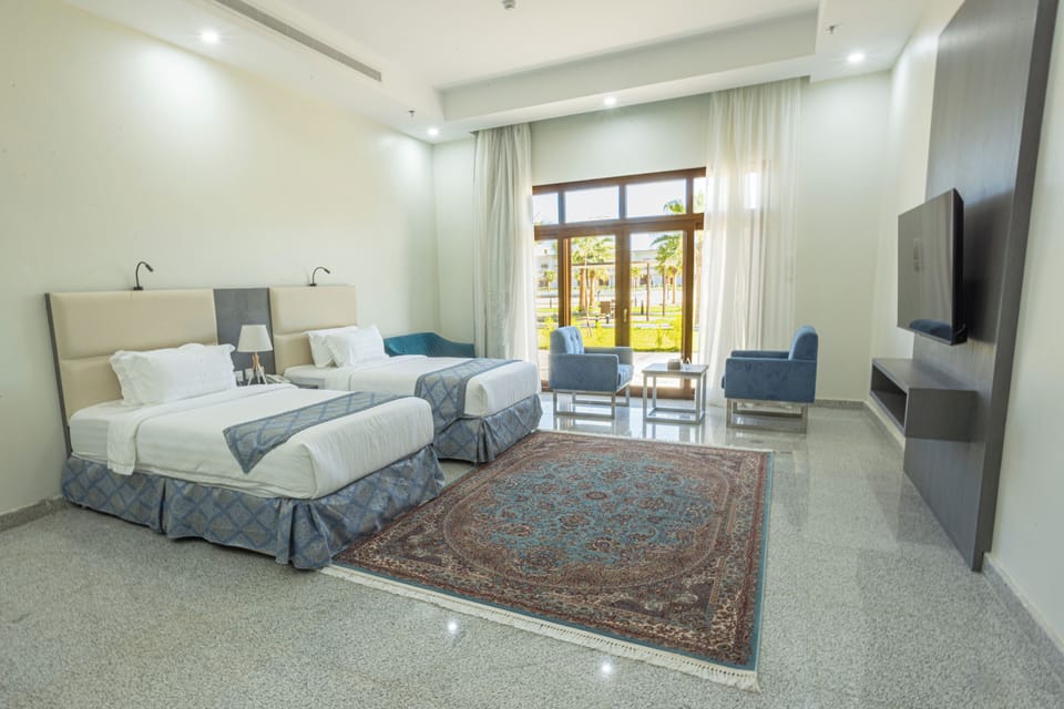 Executive Double or Twin Room, Patio, Resort View | Minibar, in-room safe, blackout drapes, soundproofing