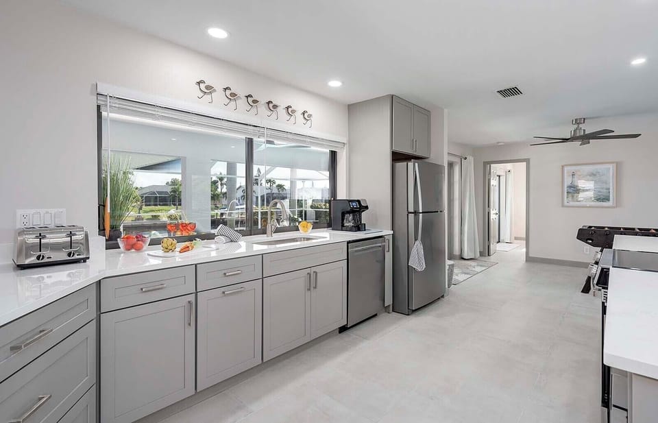 Large Open Kitchen with Stainless Appliances