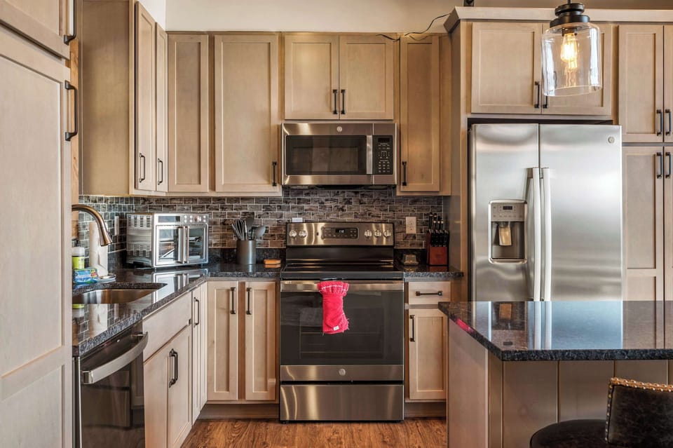 Step into our dream kitchen, where modern elegance meets functional design.