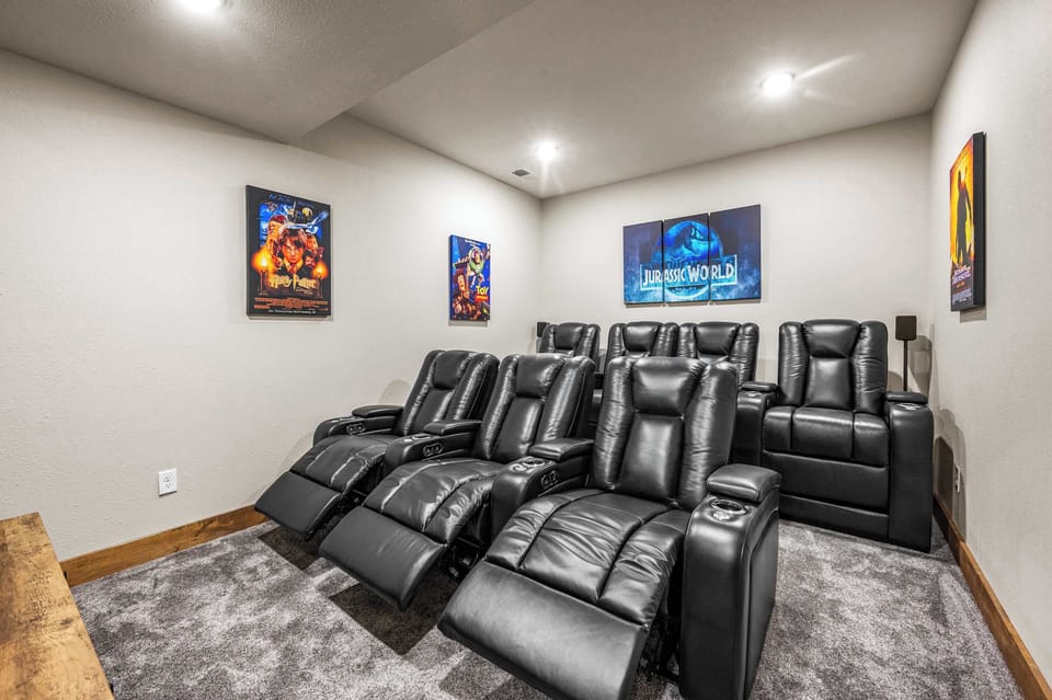 Get ready for an unforgettable movie night in our luxurious home theater room, designed to bring the magic of the big screen right to you.