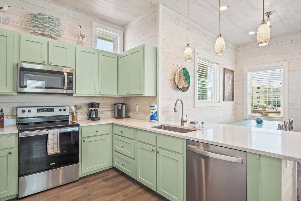 Whip up your favorite dishes with ease in our fully equipped kitchen – the heart of your vacation home.