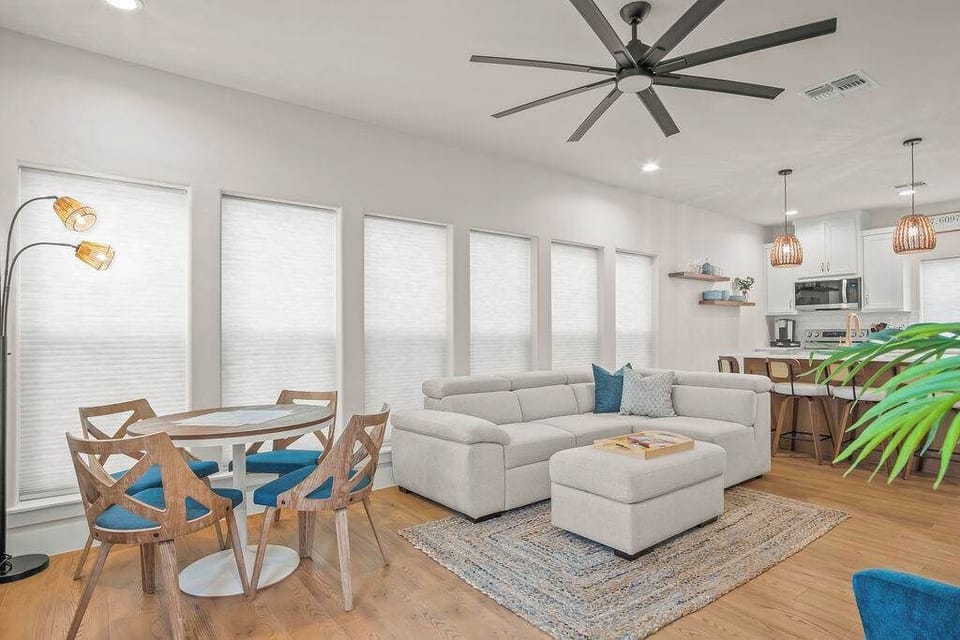 Experience seamless living with our open floor plan, where the kitchen, dining, and living spaces flow effortlessly together.