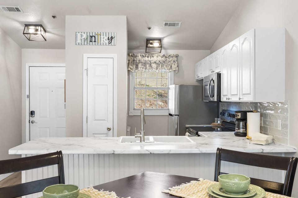 Condo, 1 King Bed with Sofa bed, Balcony, Golf View (Calm Waters Condo) | Private kitchen | Fridge, microwave, oven, stovetop