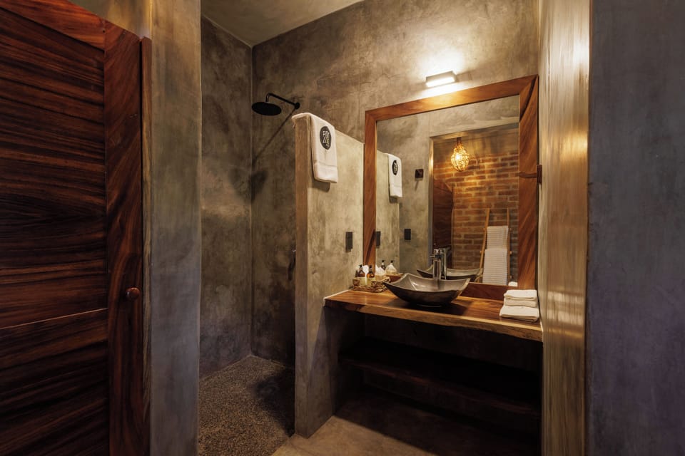 Shower, rainfall showerhead, bathrobes, towels