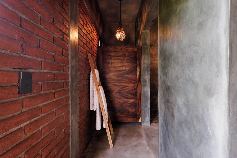 Shower, rainfall showerhead, bathrobes, towels