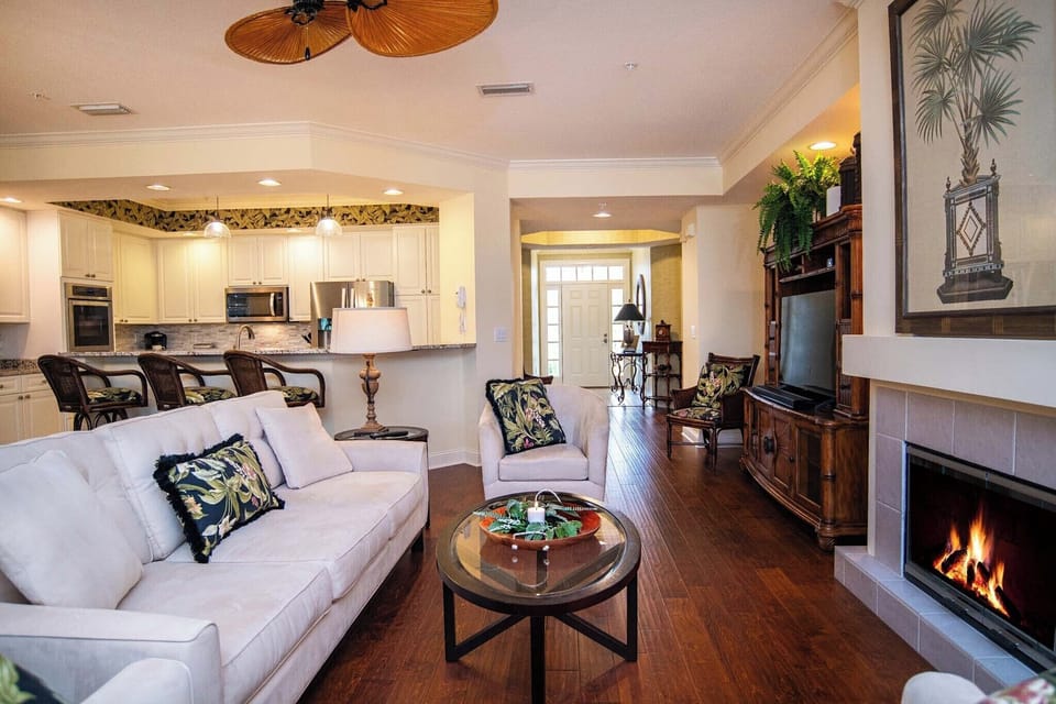 Living Area to Kitchen and Foyer