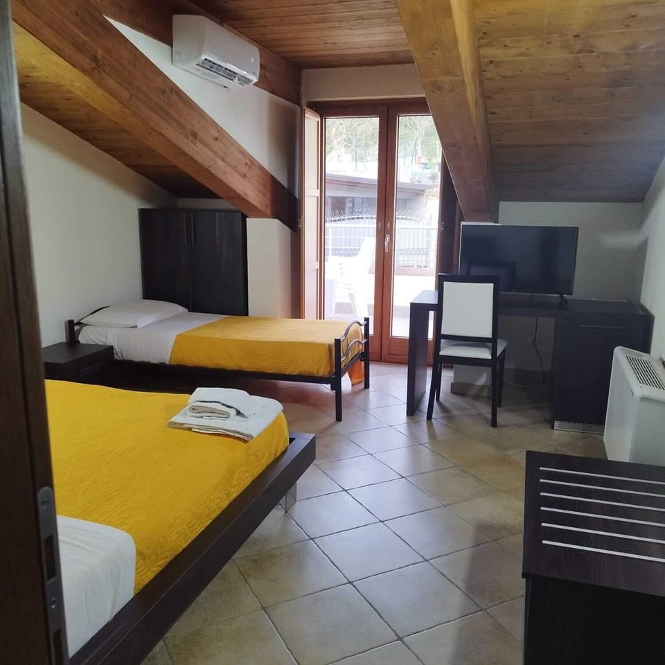 Luxury Triple Room, Pool View | Premium bedding, down comforters, pillowtop beds, minibar