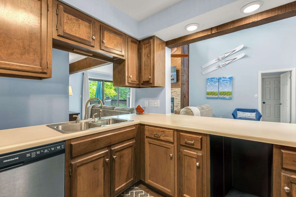 The inviting kitchen offers ample space & all the comforts of home