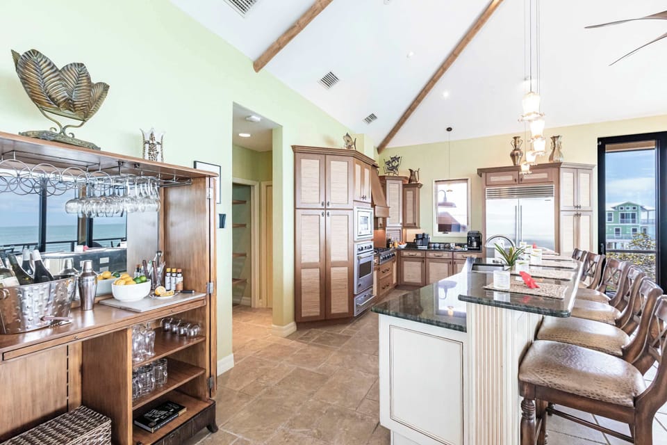 You will have plenty of space to cook, enjoy cocktails, or simply spend time together in the oversized kitchen. 