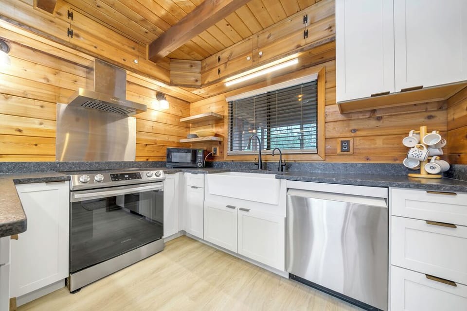 Newly Renovated Kitchen with Stainless Appliances and Granite Countertops.