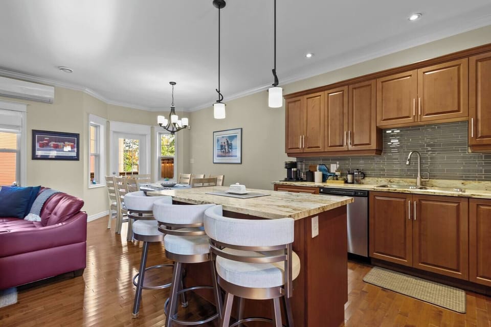 Kitchen island seating creates a great spot for morning coffee or casual conversation.