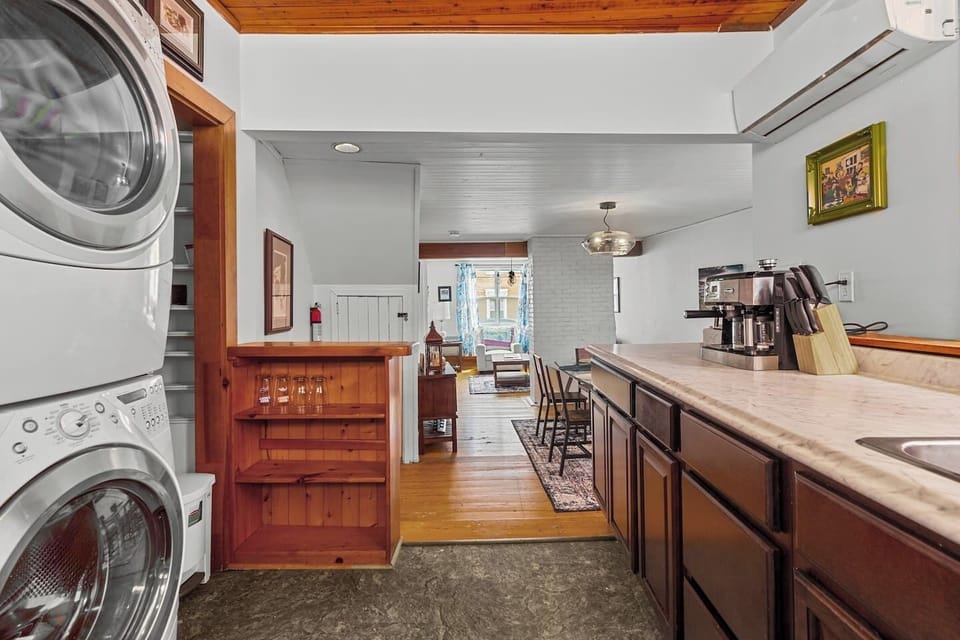 For the ultimate convenience, this unit features a washer and dryer—a must for travelers looking to keep their clothes fresh on the go. #StJohn's