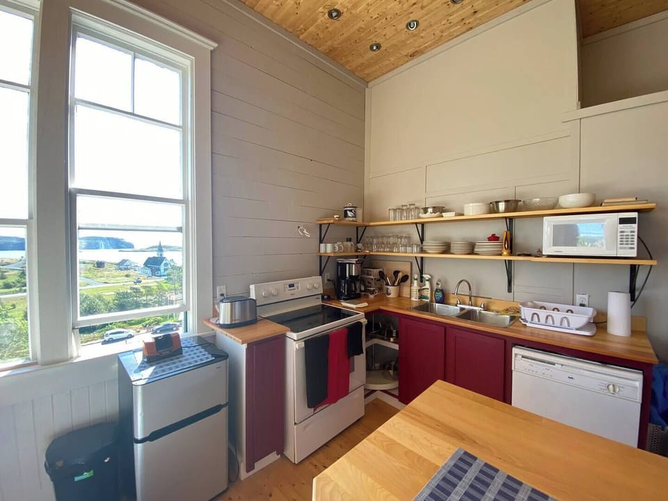 Cook with a view in our kitchen overlooking Trinity's charming streets at The St. Paul Schoolhouse. 
