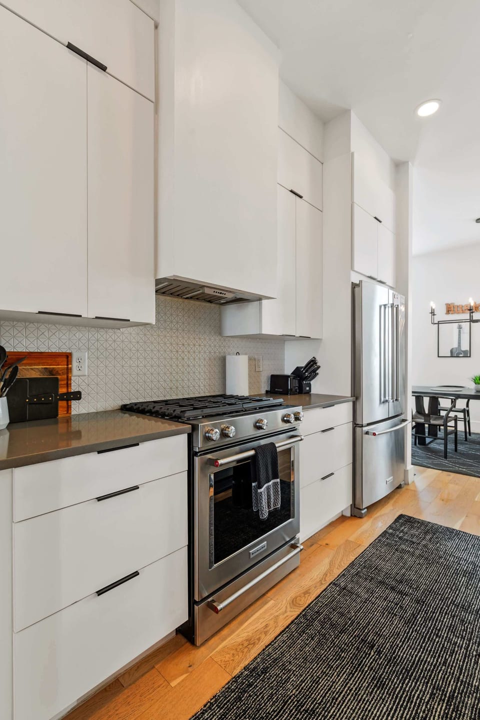 Modern kitchen featuring premium stainless steel appliances.