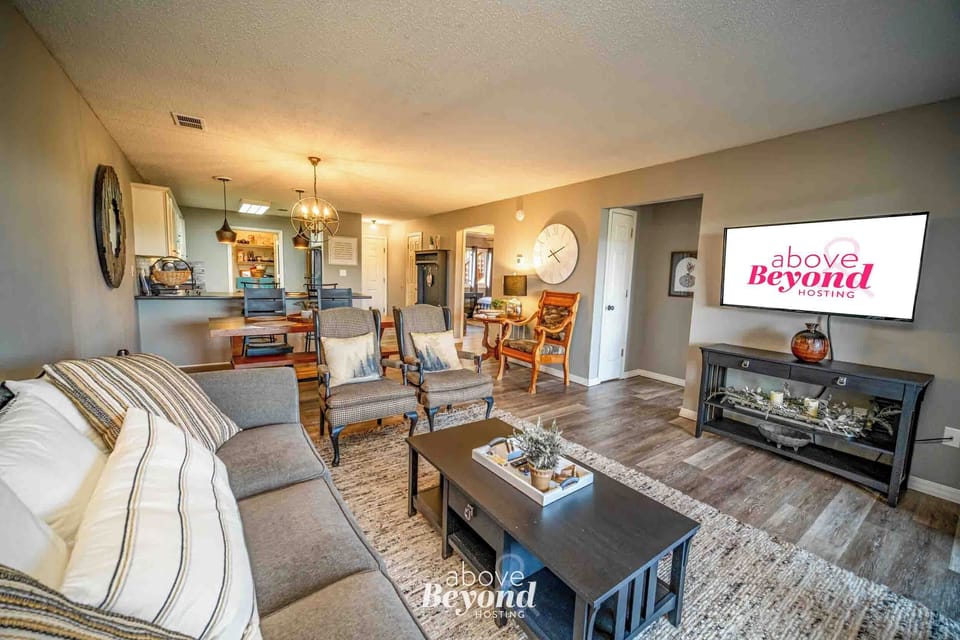 Spacious open-concept living area with cozy seating, TV, and room to unwind after exploring Branson