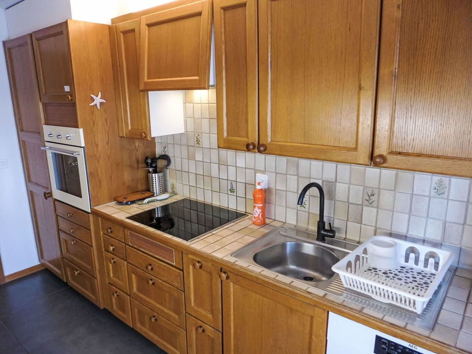 Kitchen, Countertop, Cabinetry, Flooring, Kitchen Appliance, Major Appliance, Wood, Kitchen Sink, Floor, Furniture