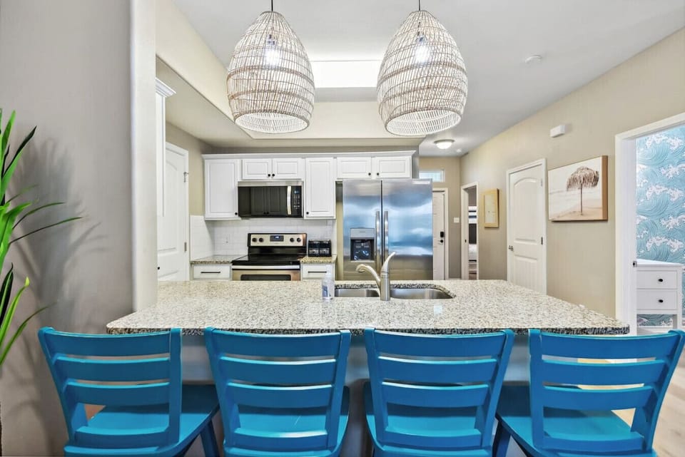 Rattan pendant lighting and island bar view.