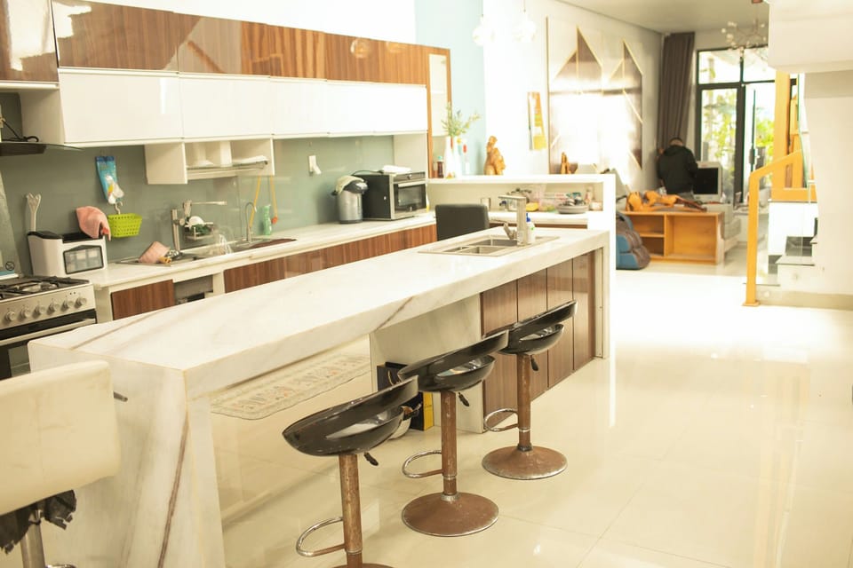 Deluxe House, Balcony, Garden View | Shared kitchen