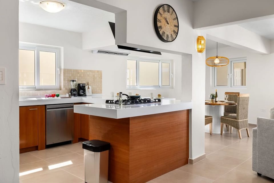 Cook like a pro with state-of-the-art appliances, spacious countertops, and all the essentials. Enjoy your meals at the dining table for 4 or the cozy kitchen bar.