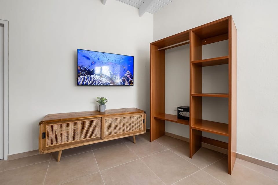 Retreat to two serene bedrooms featuring king-size beds, premium linens, and Smart TVs. Wake up refreshed in your tropical paradise with all the comforts of home