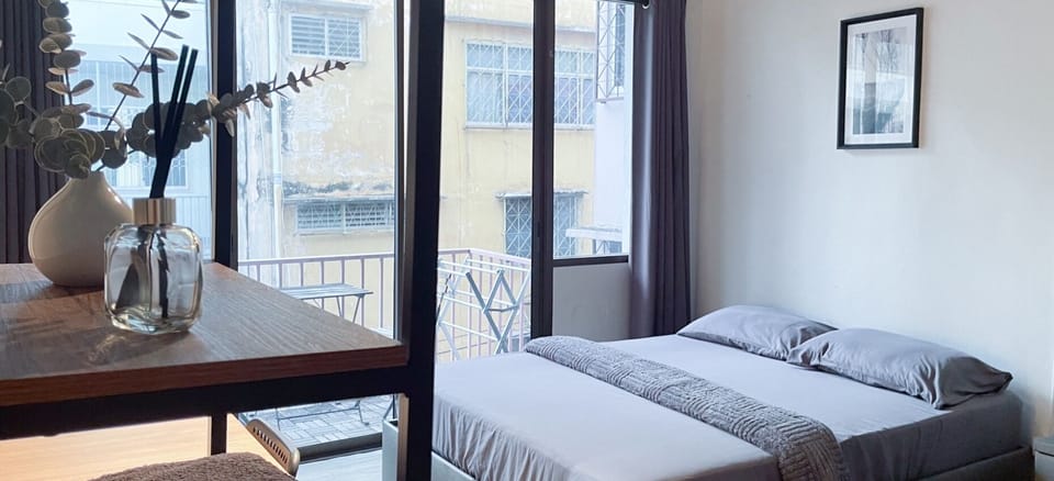 Family Quadruple Room, Kitchenette, City View | Blackout drapes, iron/ironing board, free WiFi