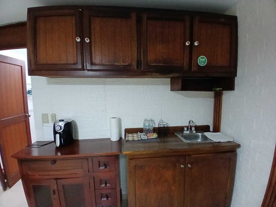 Basic Studio, Courtyard View | Private kitchen | Espresso maker, coffee/tea maker, electric kettle, toaster