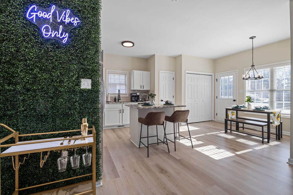 Open floor plan concept featuring the dining area and kitchen