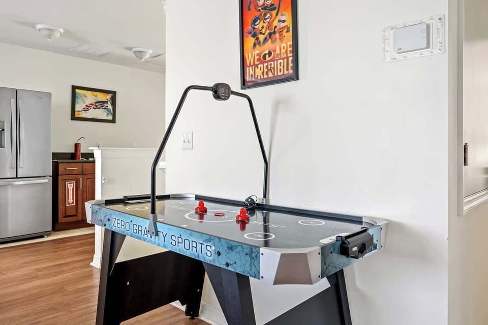 Air Hockey Showdown! Score Big Fun in Our Airbnb Game Room 