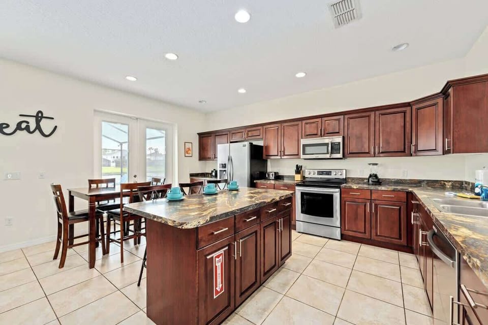 A Dreamy Traditional Open-Concept Kitchen Awaits at Our Lake Berkley Resort 