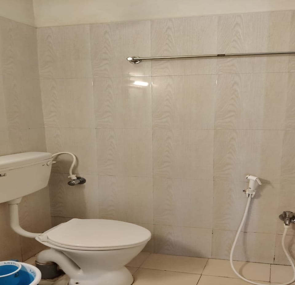 Shower, rainfall showerhead, towels, soap