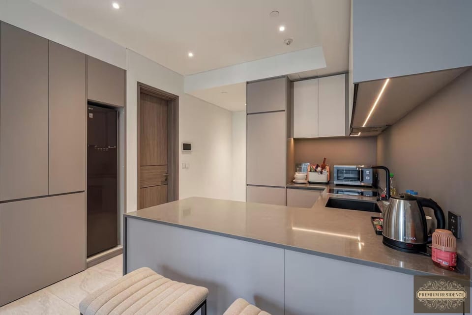 Design Apartment, 1 Bedroom, Balcony, City View | Minibar, desk, laptop workspace, iron/ironing board