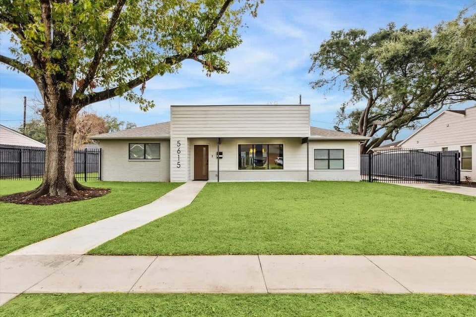 Street view of the luxurious modern home you'll stay in