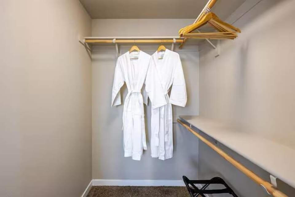 Wrap up in this plush white bathrobe after a shower