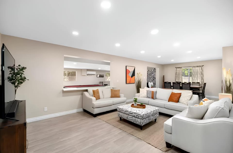 Sink into comfort on our large plush sofa, designed to bring the living room and kitchen together in one inviting space.