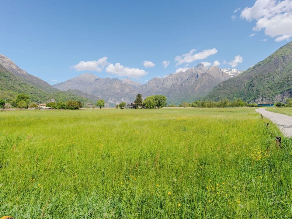 Mountainous Landforms, Green, Mountain, Grass, Natural Environment, Natural Landscape, Hill, Grassland, Mountain Range, Plain