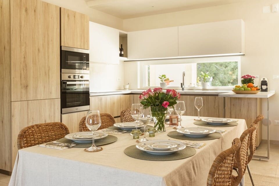 Furniture, Interior Design, Kitchen, Countertop, Wood, Cabinetry, Kitchen Appliance, Tableware, Flooring, Kitchen & Dining Room Table