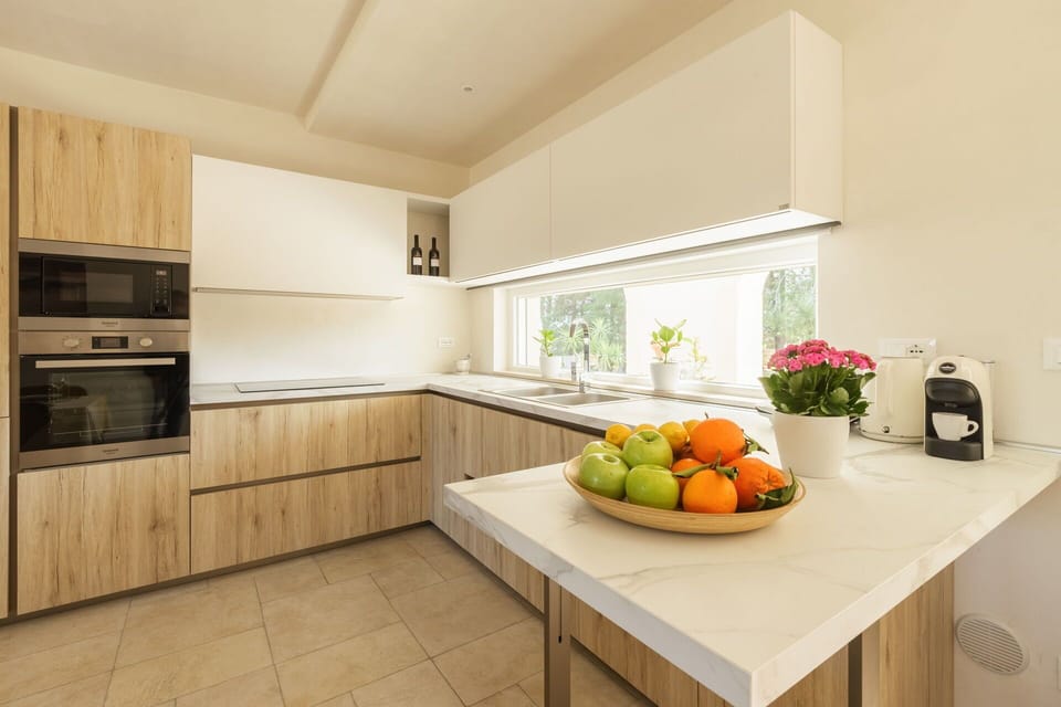 Kitchen, Countertop, Interior Design, Kitchen Appliance, Cabinetry, Furniture, Flooring, Wood, Home, Major Appliance
