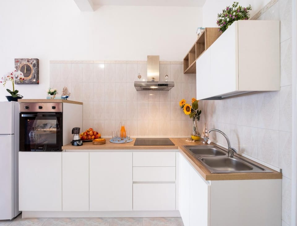 Villa, Patio, Sea View | Private kitchen | Full-size fridge, oven, stovetop, cookware/dishes/utensils
