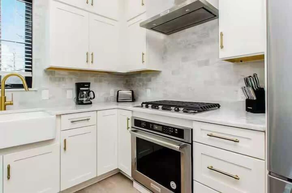 Dream Kitchen! Our new kitchen has it all! Stainless steel appliances, gas stove, and stylish details—perfect for whipping up delicious meals! 