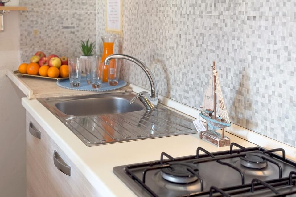 Villa, Patio, Sea View | Private kitchen | Fridge, oven, stovetop, cookware/dishes/utensils