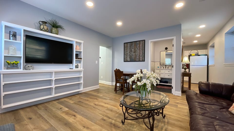 Experience ultimate comfort in a newly renovated modern living room designed for style and relaxation!